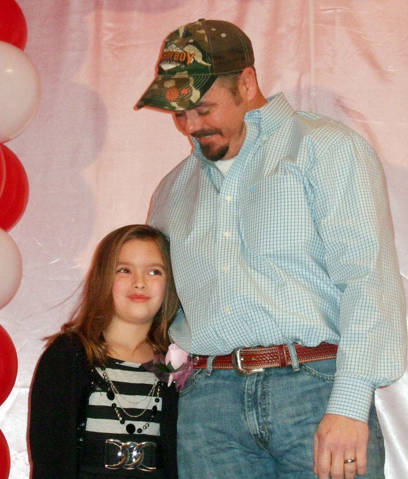 photo of a dad and daughter